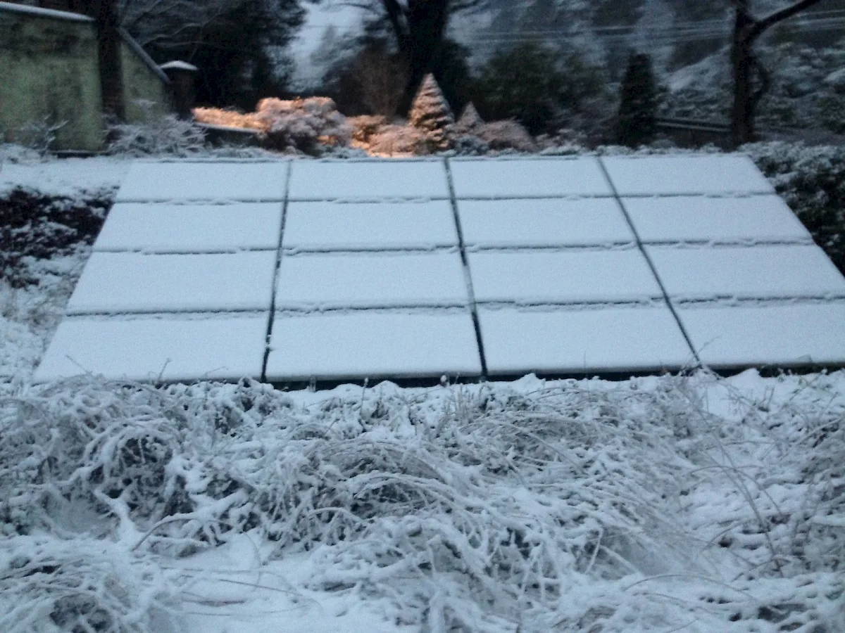 Solar panels under snow in the Blue Mountains